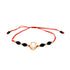 The Big Zirconia Red String Lucky Bracelet and Black Beads Rope features a central teardrop-shaped clear Cubic Zirconia encased in a 14k gold-filled setting, complemented by faceted black beads and small gold beads with an adjustable knot closure.